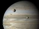 Europa and Io in front of Jupiter